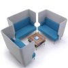 Blue and grey booth seating and square coffee table