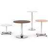 Four bistro tables in different finishes and heights