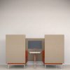 Orange and grey booth seating with white table