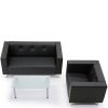 Black leather sofa and armchair, and glass topped coffee table