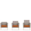 3 armchairs with orange seats and grey backs