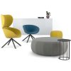 Breakout seating with large yellow chair, small blue chair, large grey pouff and small yellow pouff